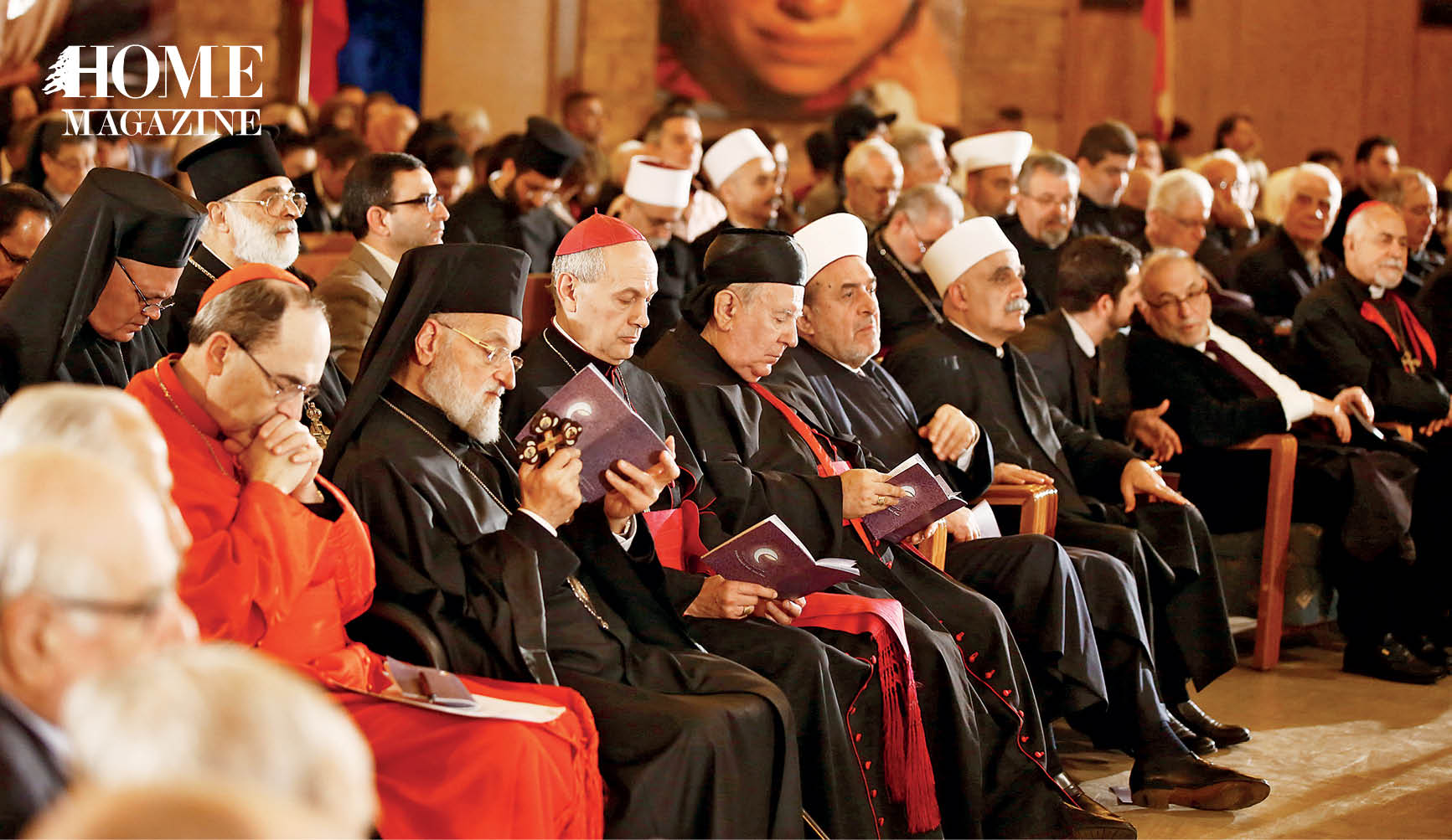 Priests and cheikhs in black robes and white hats praying
