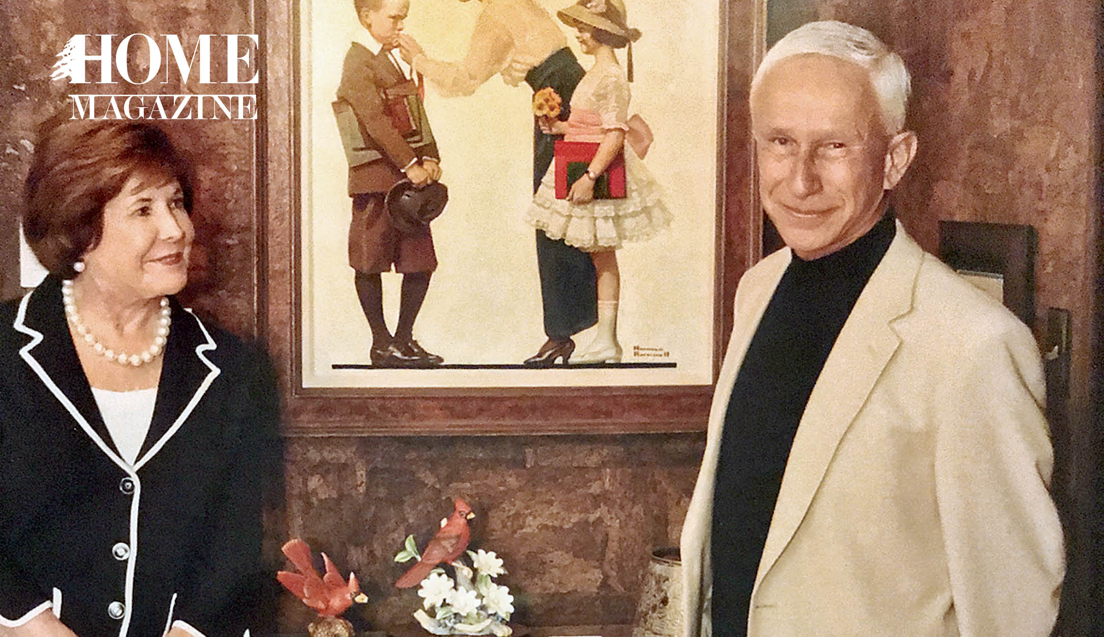 Old man woman in front of wooden table