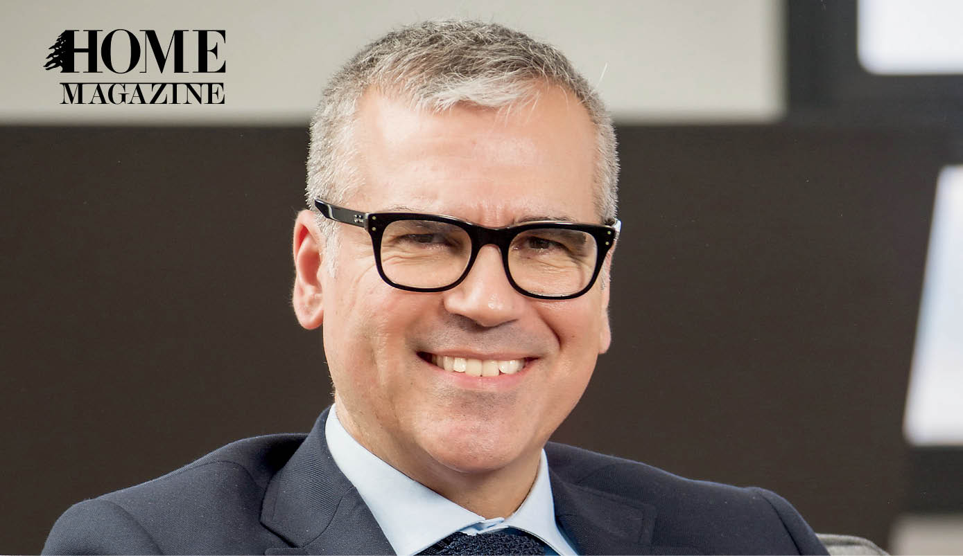 Man with glasses and grey hair