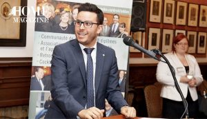 Smiilng man giving speech