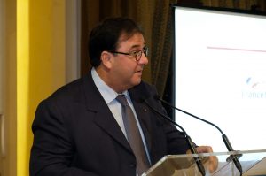 Man wearing suit and eye glasses