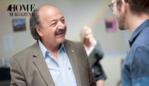 Half bold old man smiling