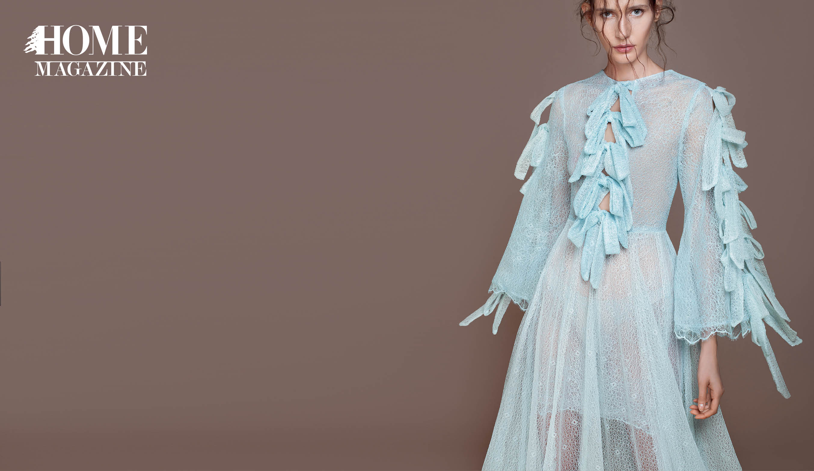 Model in light blue dress