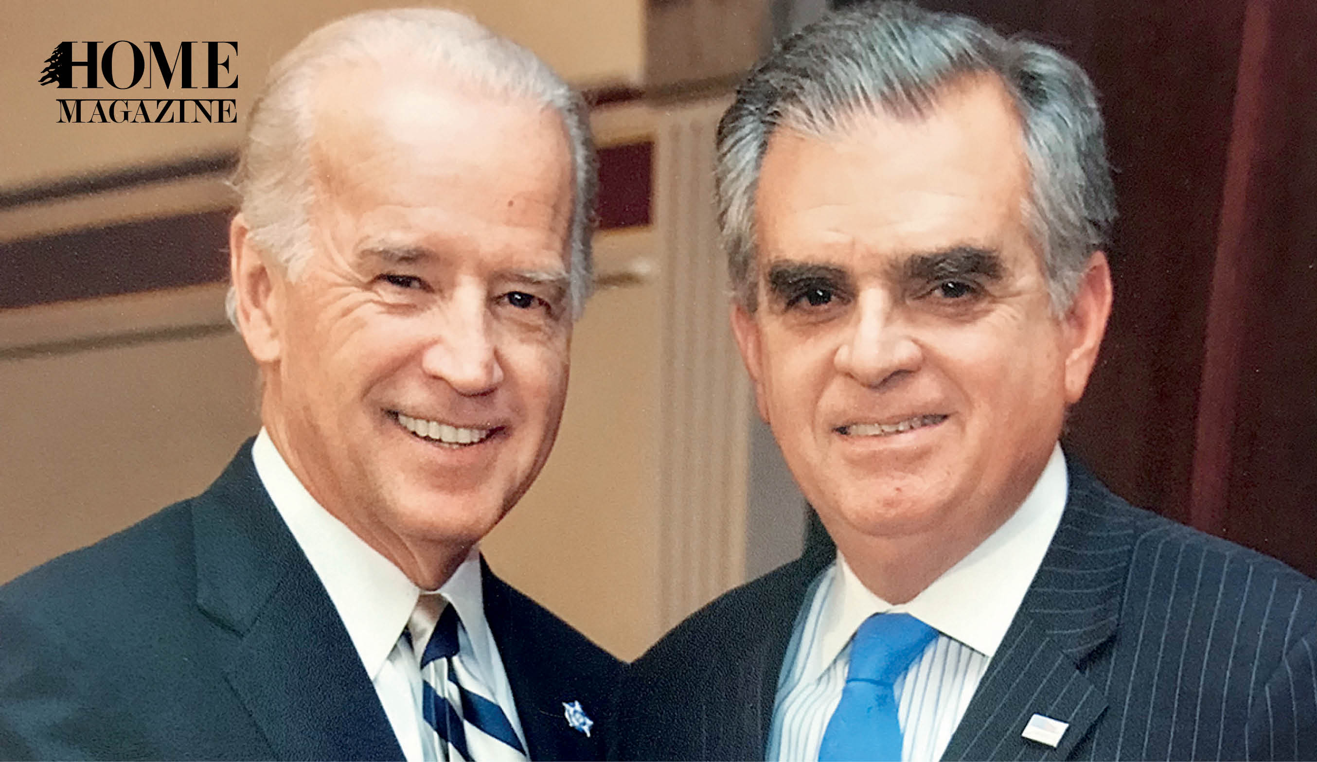 Two smiling mean in suits