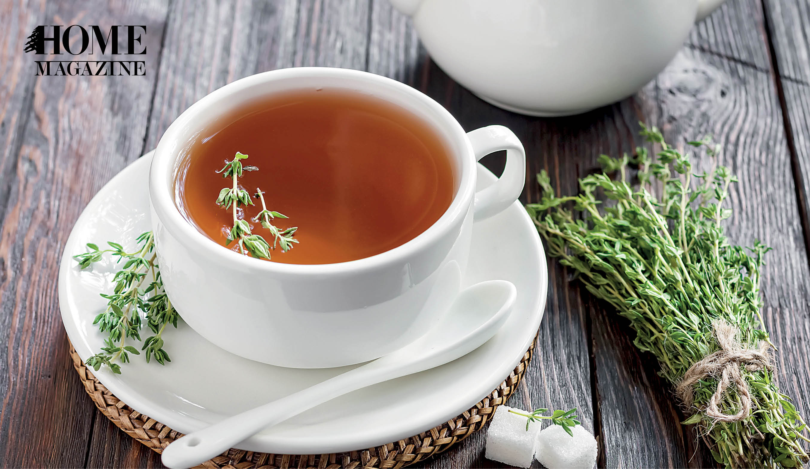 Green leaves with light brown colored fluid in white cup