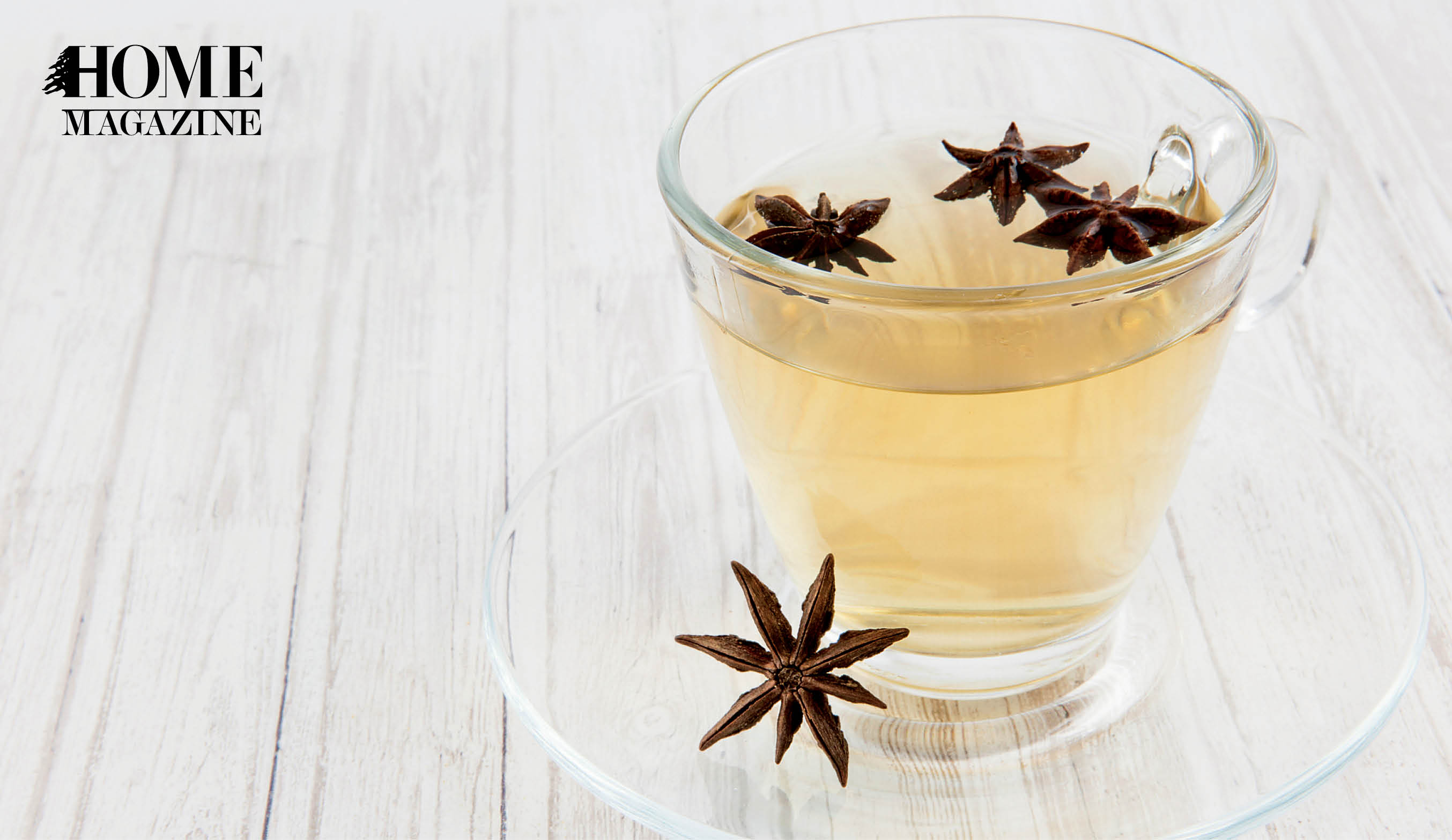 Green fluid in a cup with brown flowers