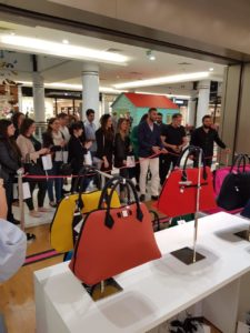 Bags stand with crowd