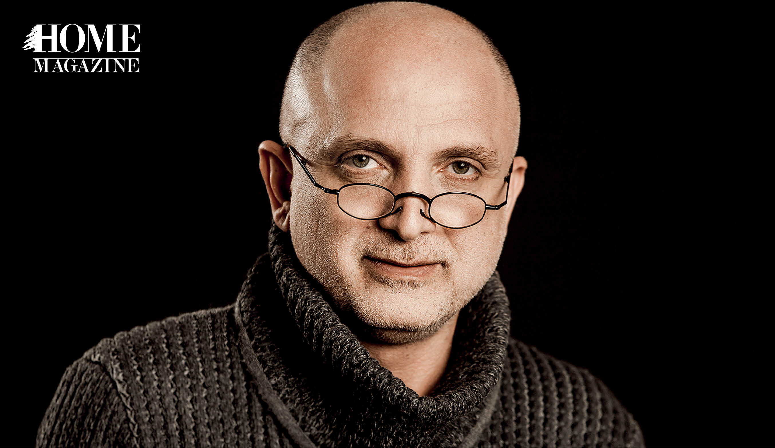 Bald man wearing eyeglasses