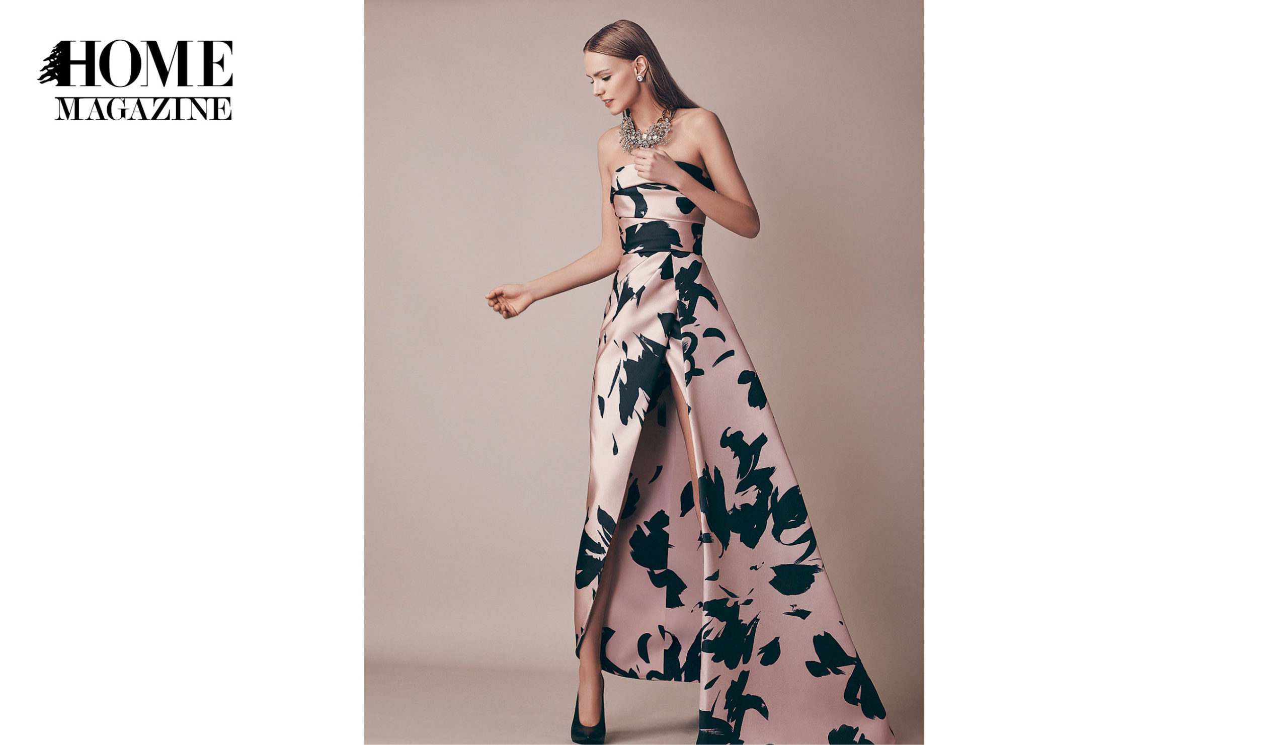 Model wearing black and bronze flower printed dress