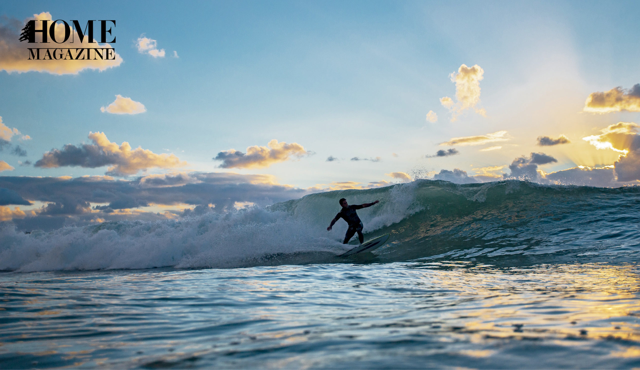 Man surfing a wave and blue sky