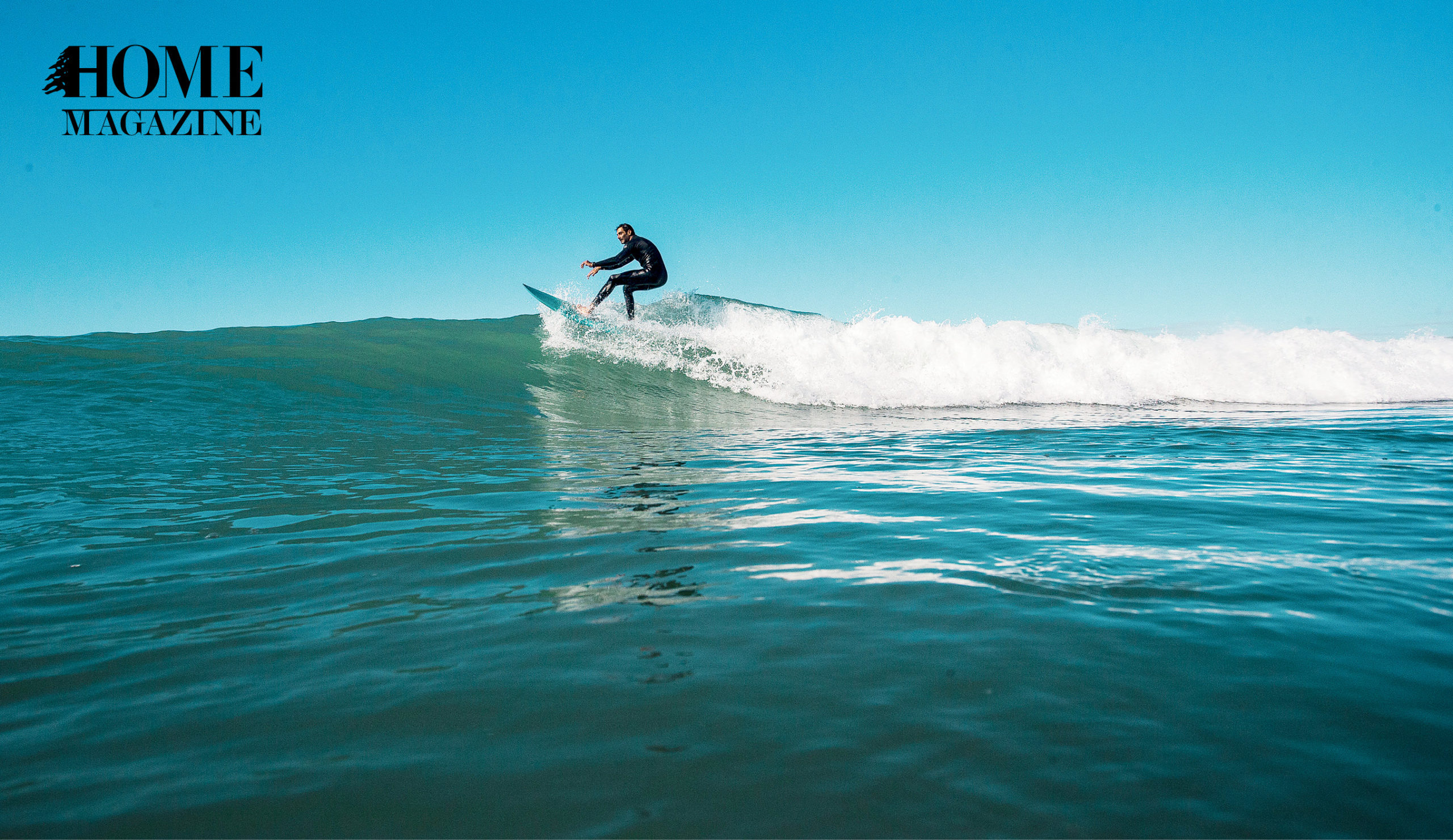 Man riding a board on waves of sea