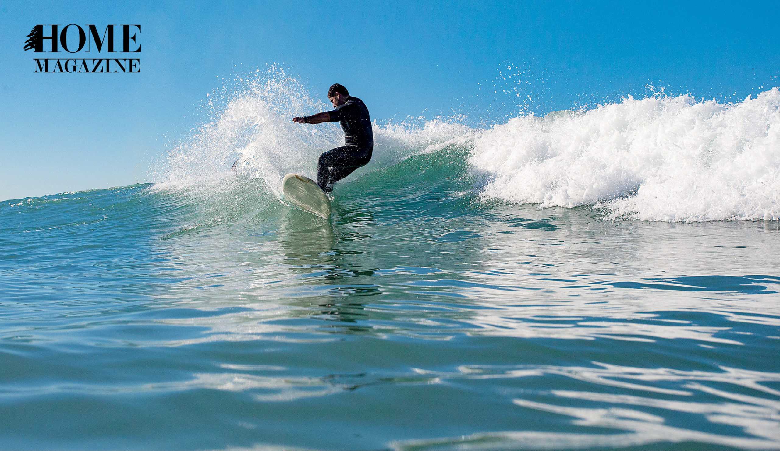 Man riding a board on waves