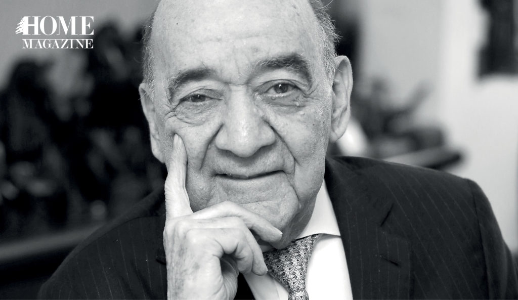 Portrait of a bald man in a suit