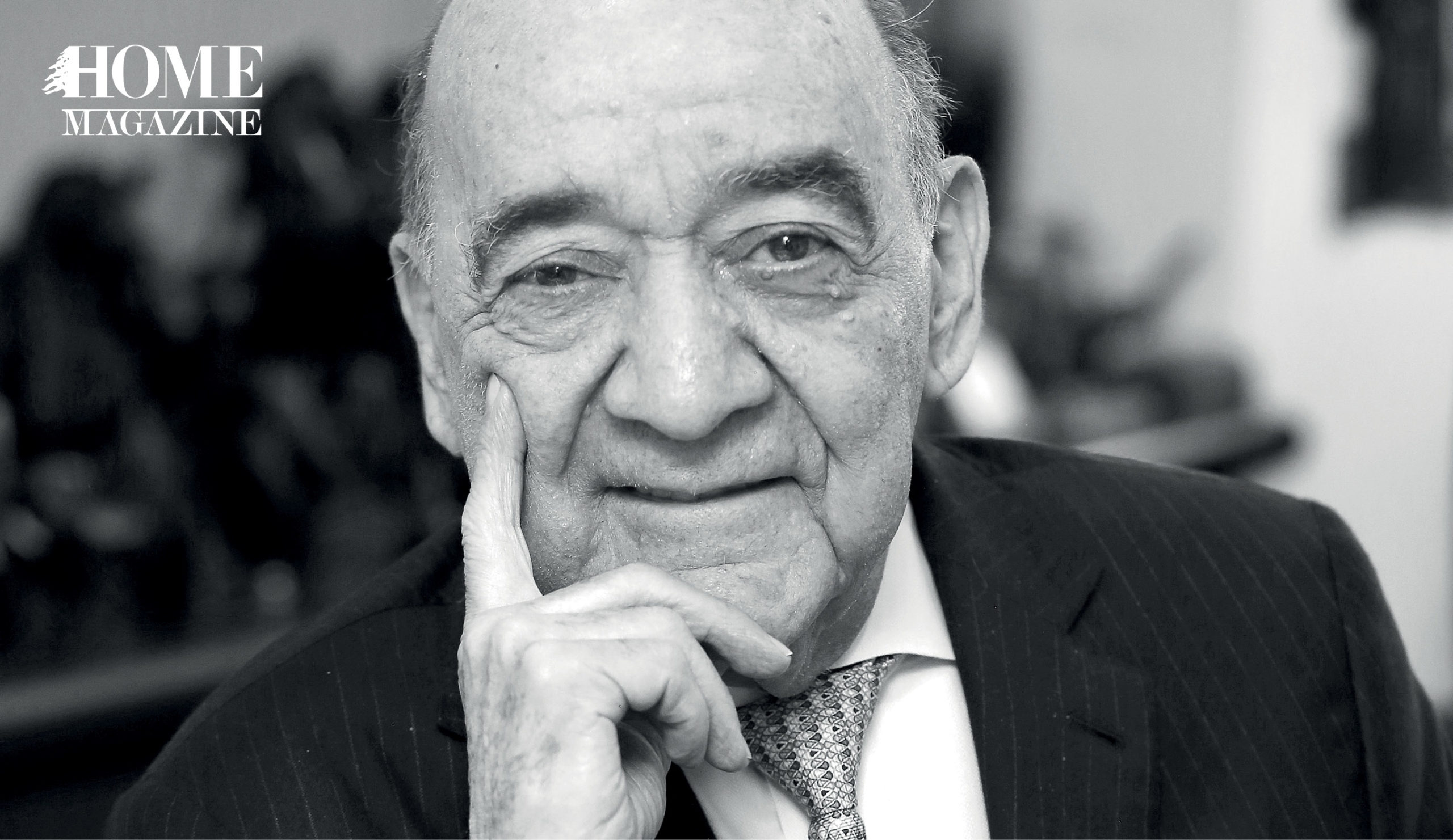 Portrait of a bald man in a suit