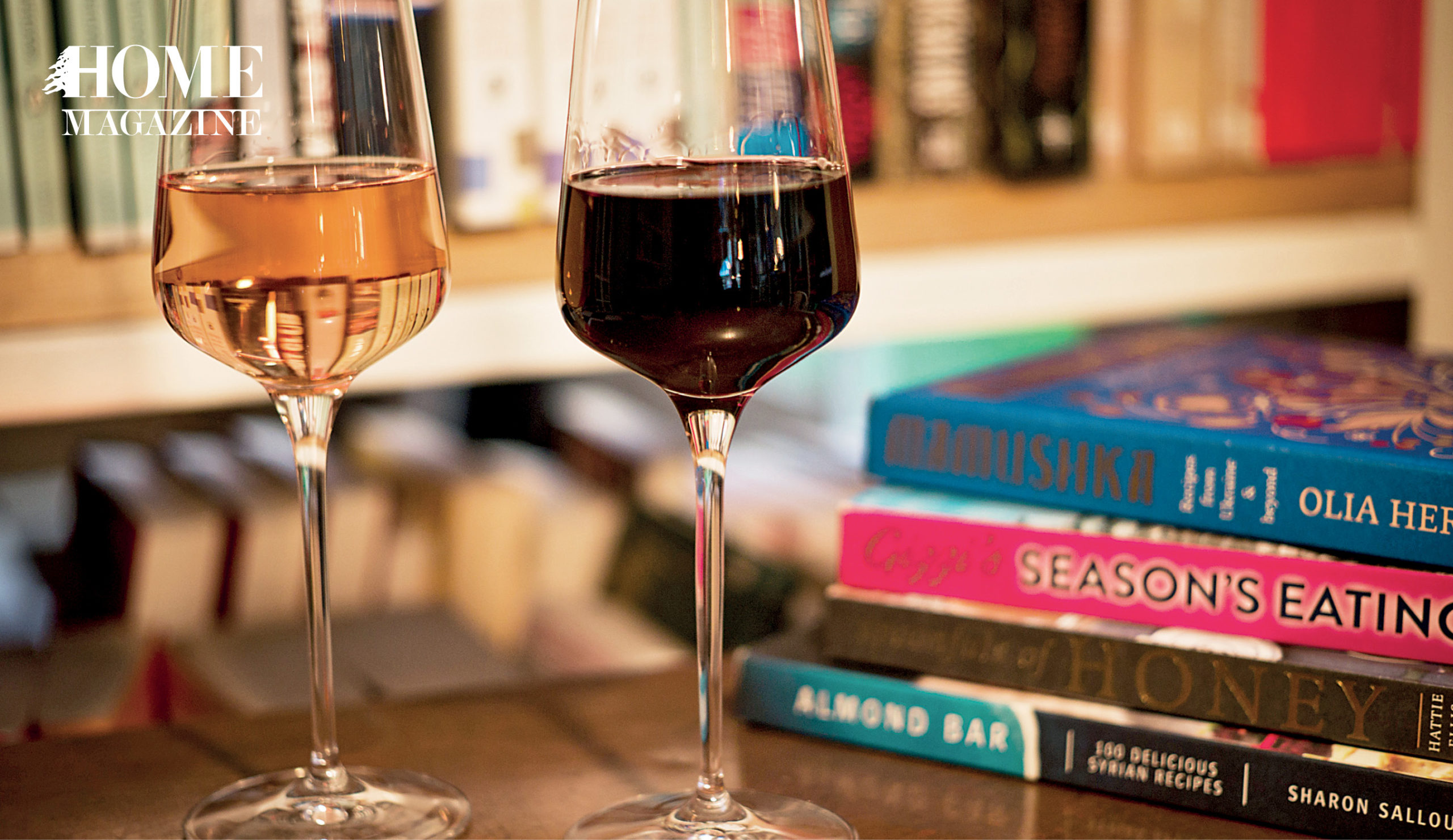 Two glasses of wine and books