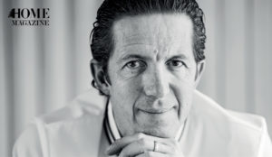 Black and white face portrait of a man with black hair