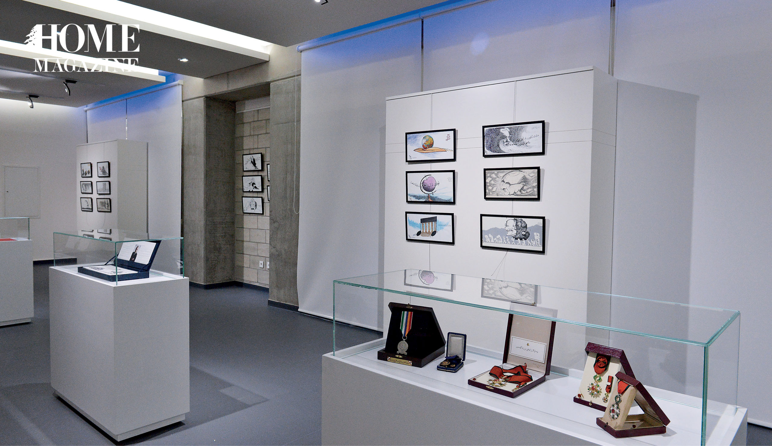Interior room with trophies inside glass and pictures on wall