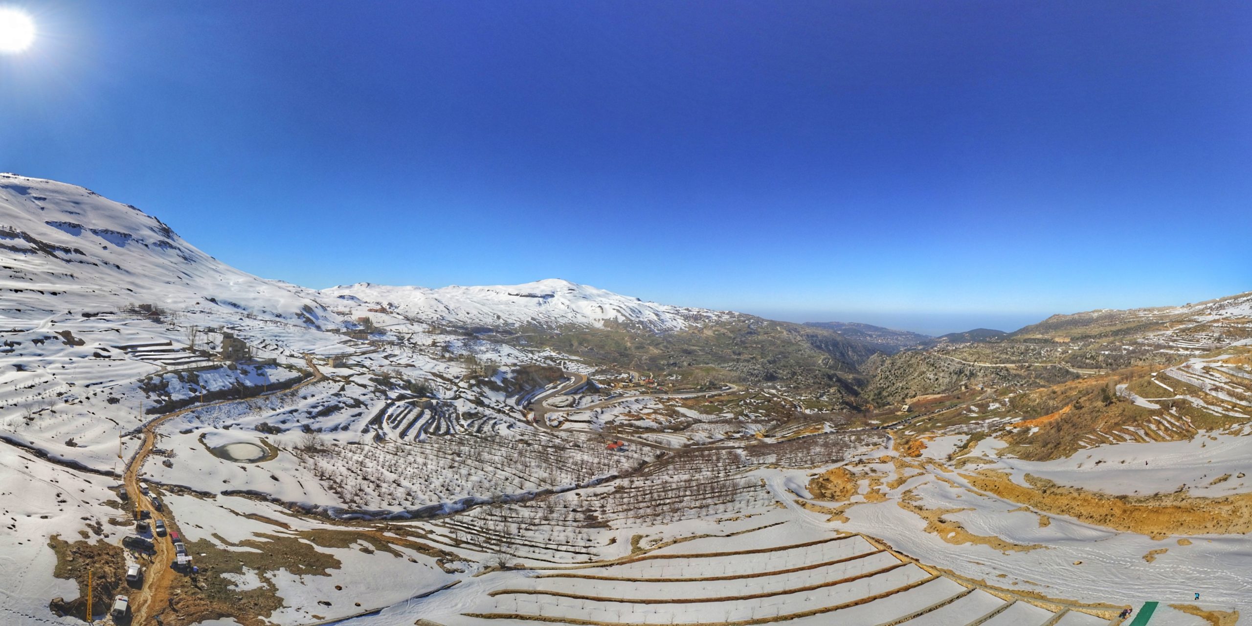 Mountains of snow and blue sky