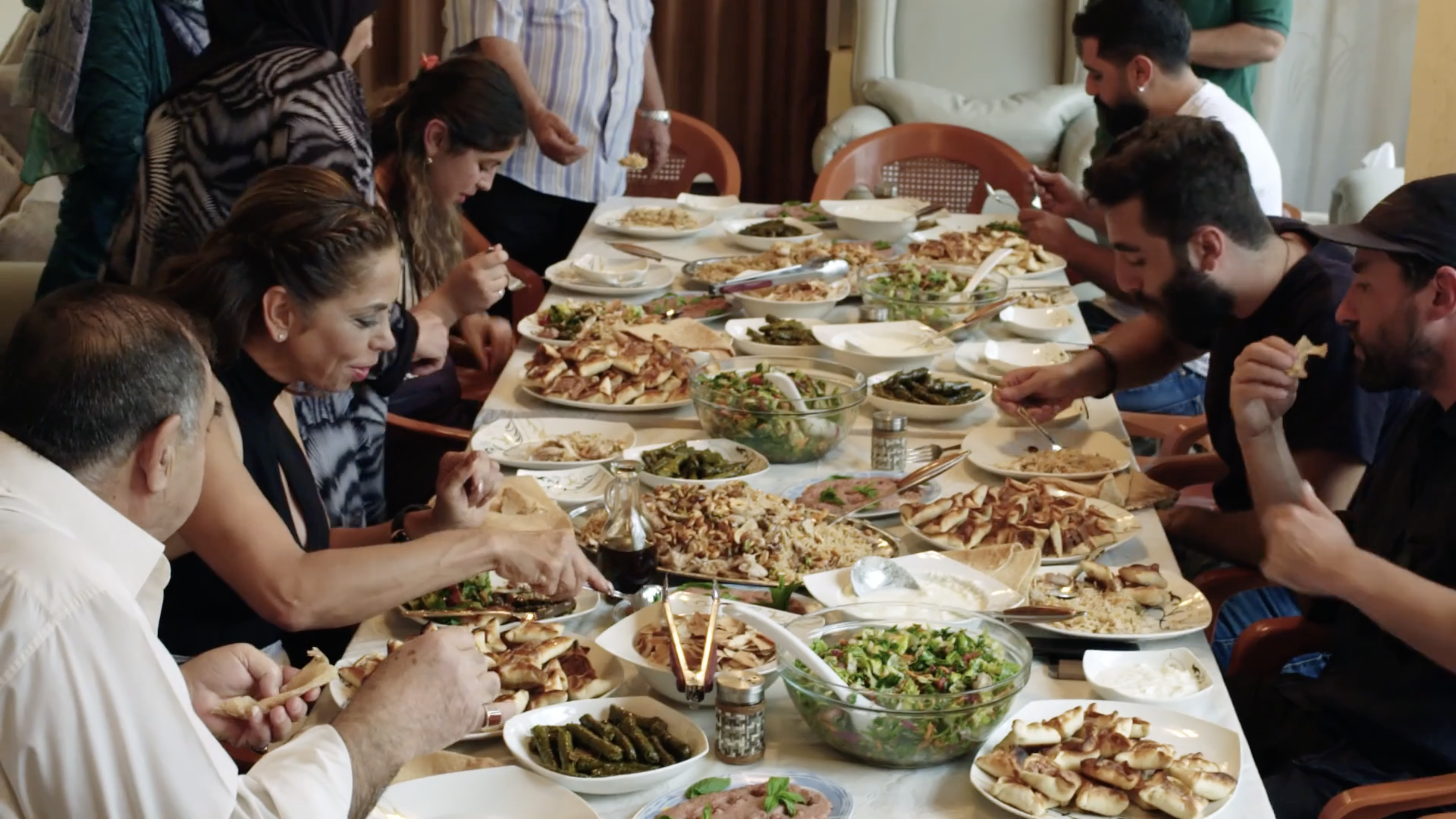 Family and Friends over a table having lunch